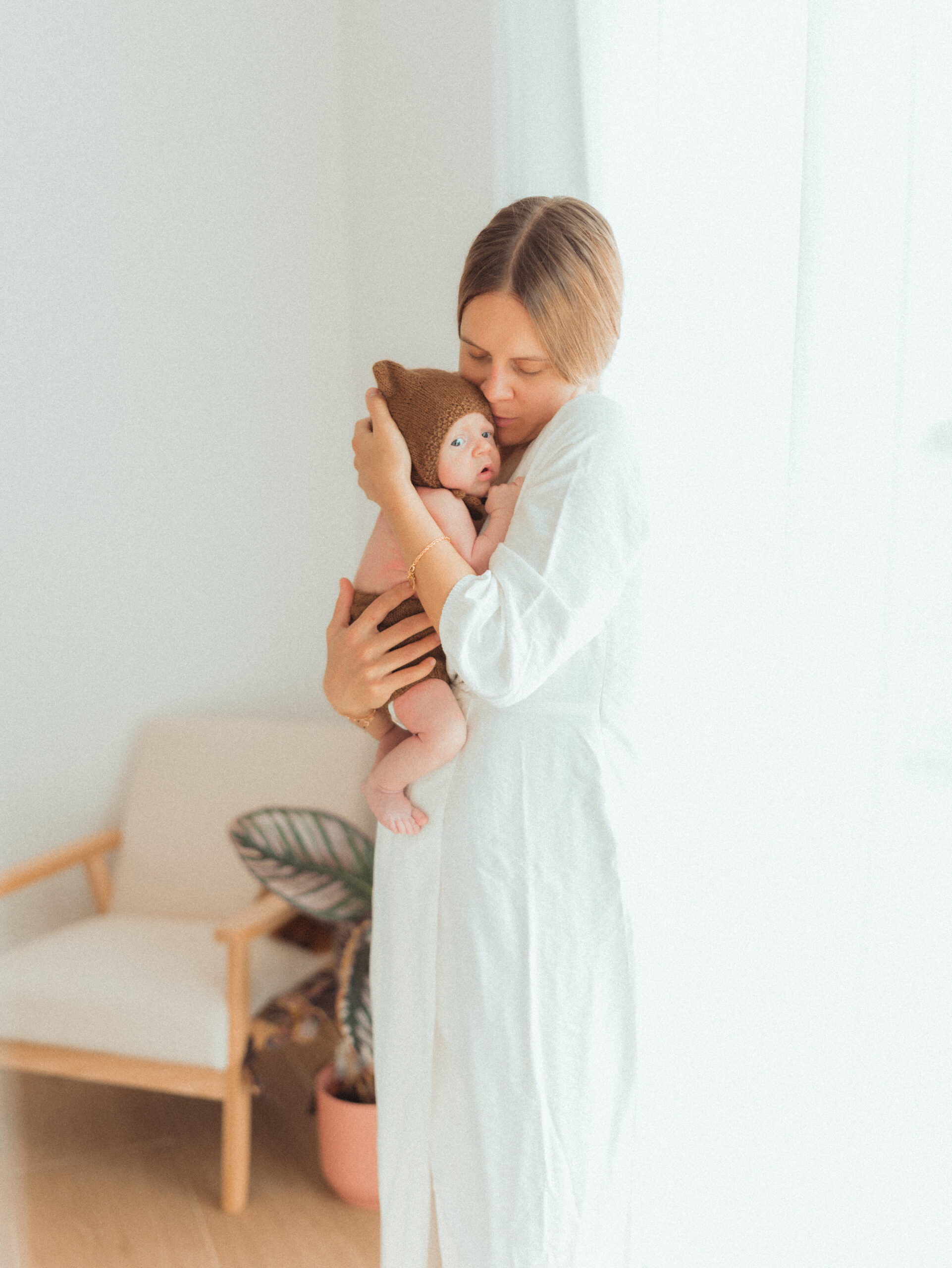 Shooting à domicile avec un bébé et sa maman